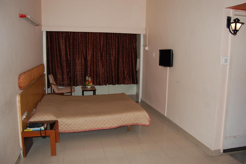 Hotel Raviraj Pune Værelse billede